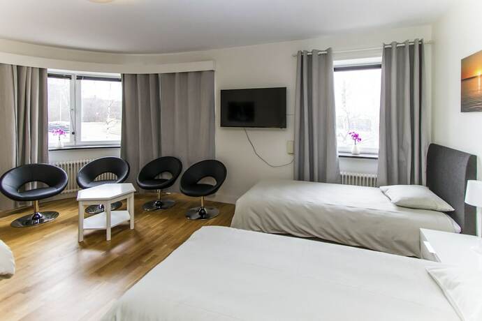 Imagen de la habitación del Hotel l Linden. Foto 14