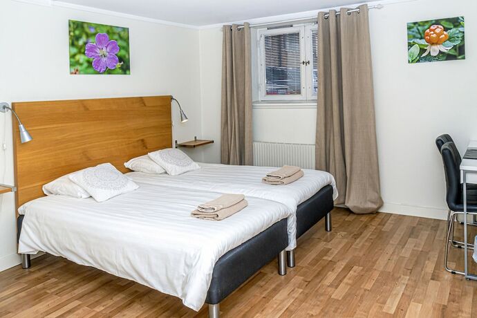 Imagen de la habitación del Hotel l Linden. Foto 15