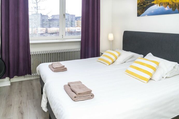 Imagen de la habitación del Hotel l Linden. Foto 16