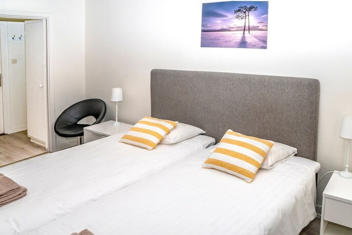 Imagen de la habitación del Hotel l Linden. Foto 17