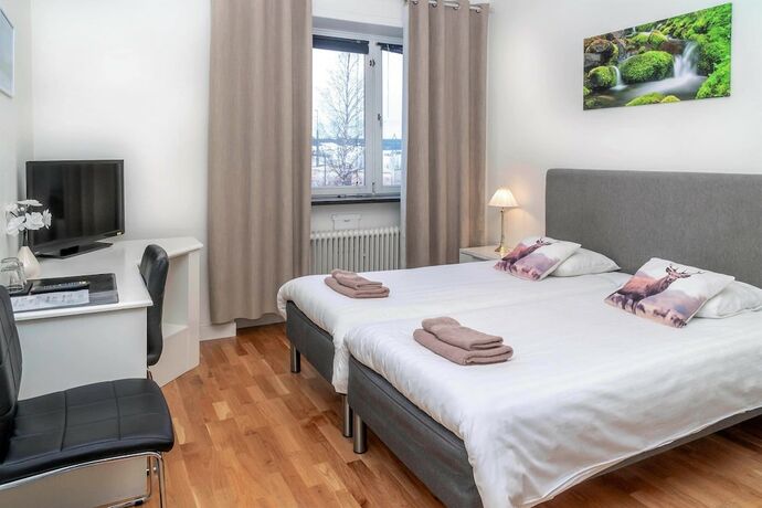 Imagen de la habitación del Hotel l Linden. Foto 19