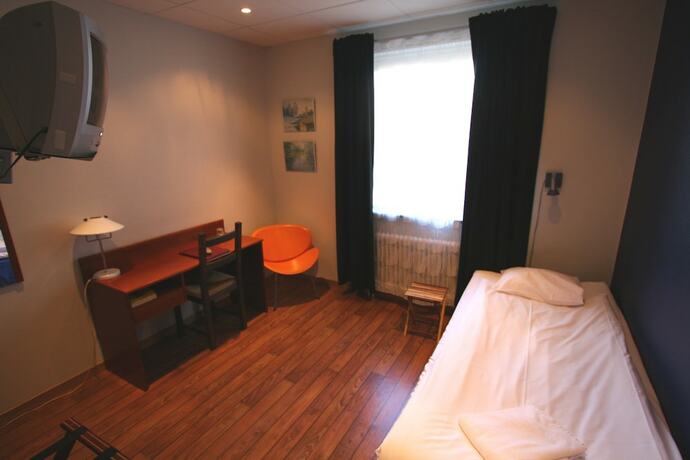 Imagen de la habitación del Hotel l Linn&eacute;a. Foto 17
