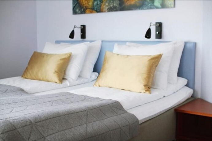 Imagen de la habitación del Hotel l Marena. Foto 7