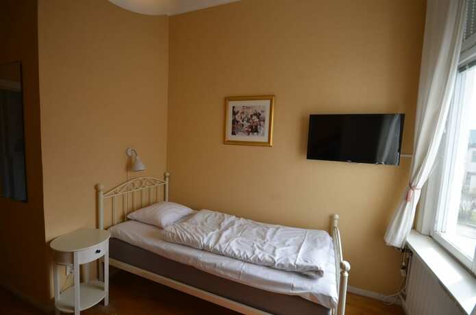Imagen de la habitación del Hotel l Royal. Foto 14