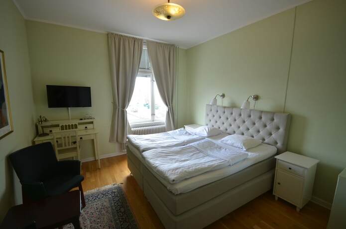 Imagen de la habitación del Hotel l Royal. Foto 19