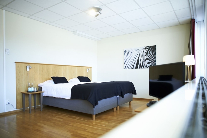 Imagen de la habitación del Hotel l Rum Oscar. Foto 4