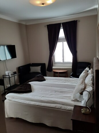 Imagen de la habitación del Hotel l S:t Olof. Foto 21