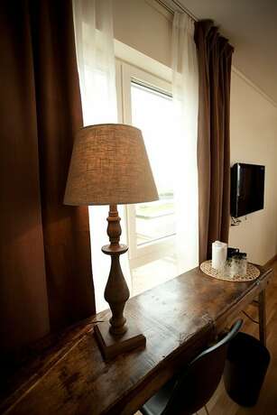 Imagen de la habitación del Hotel l Strandpensionatet. Foto 18