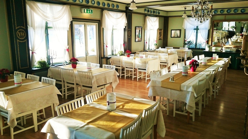 Imagen del bar/restaurante del Hotel l Torpa Pensionat. Foto 4