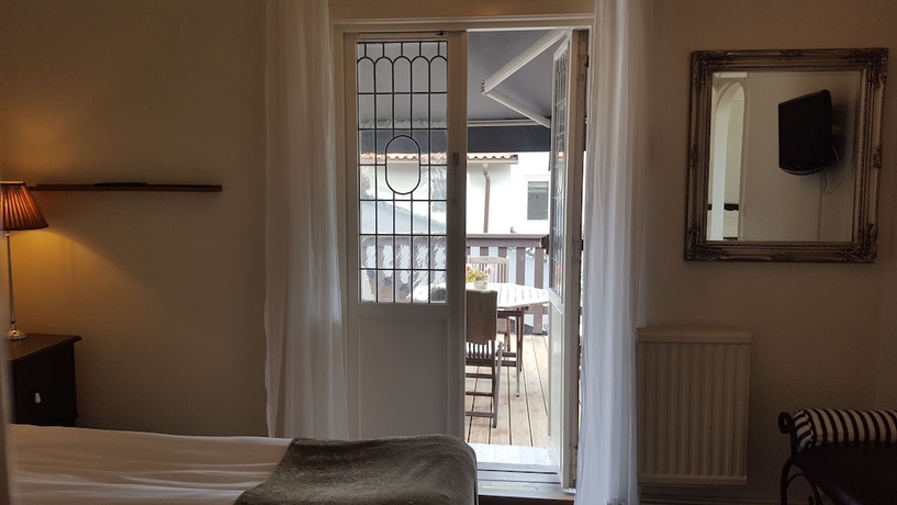 Imagen de la habitación del Hotel l Villa Borgen. Foto 6