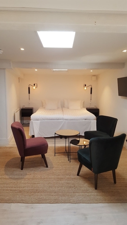 Imagen de la habitación del Hotel l Villa Borgen. Foto 11