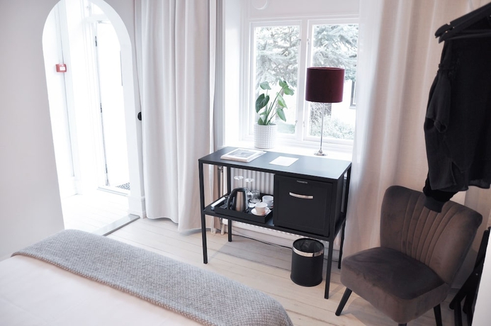 Imagen de la habitación del Hotel l Villa Borgen. Foto 14