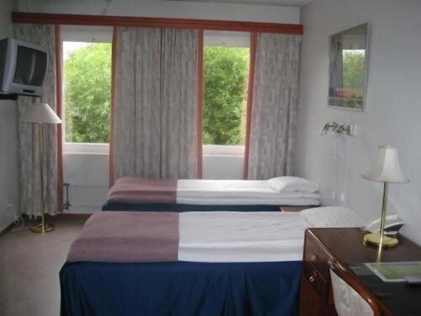 Imagen de la habitación del Hotel l Villa Sparta. Foto 14