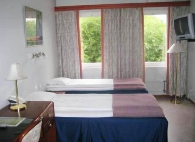 Imagen de la habitación del Hotel l Villa Sparta. Foto 15