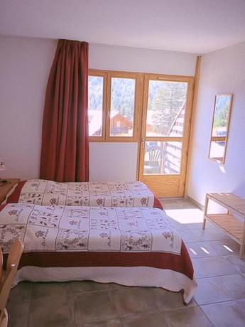 Imagen de la habitación del Hotel l\'Ecrin des Neiges. Foto 6