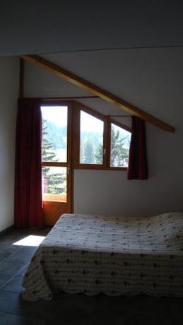 Imagen de la habitación del Hotel l\'Ecrin des Neiges. Foto 8