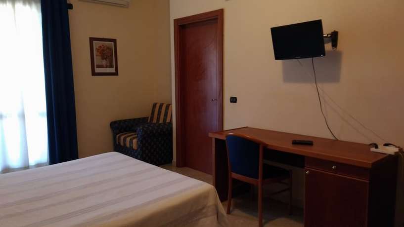Imagen de la habitación del Hotel la Falconara. Foto 16