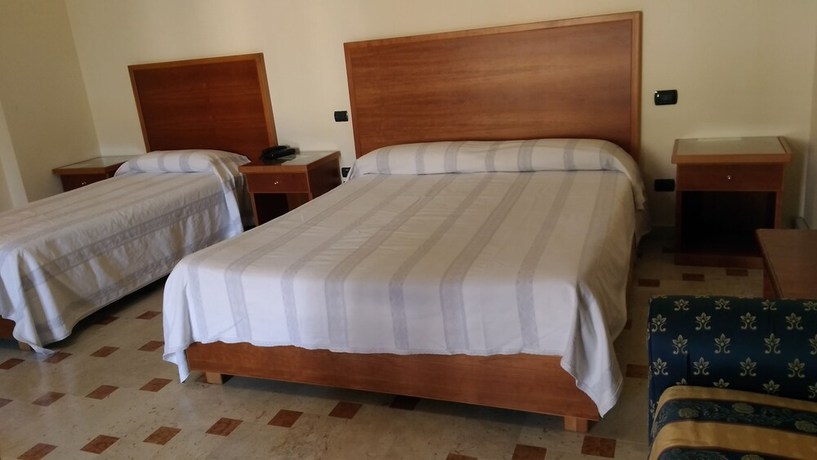 Imagen de la habitación del Hotel la Falconara. Foto 17