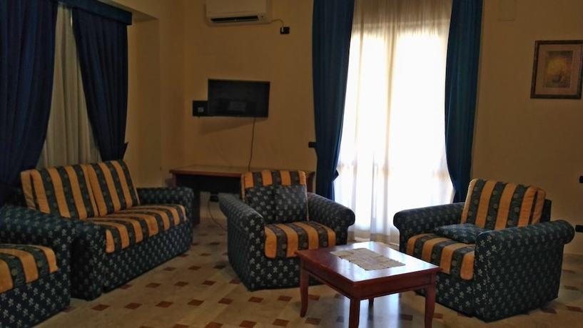 Imagen de la habitación del Hotel la Falconara. Foto 18