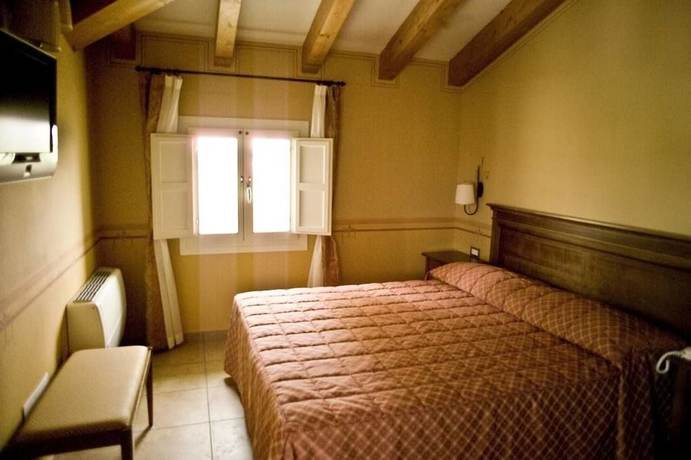 Imagen de la habitación del Hotel la Fornace. Foto 17