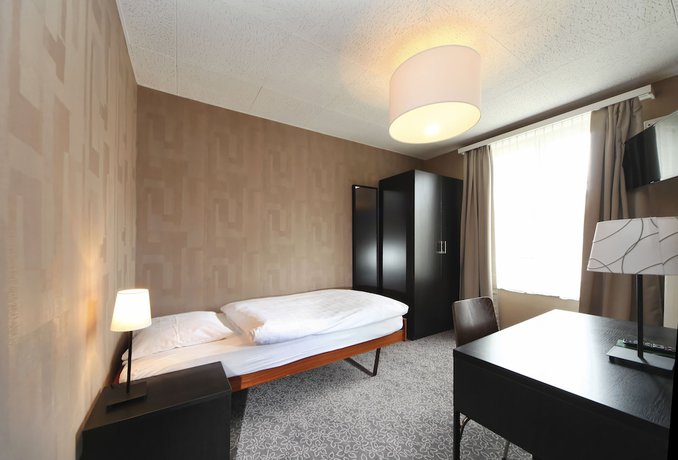 Imagen de la habitación del Hotel la Suite, Payerne. Foto 11