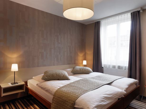 Imagen de la habitación del Hotel la Suite, Payerne. Foto 16