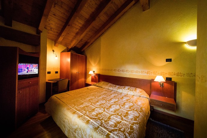 Imagen de la habitación del Hotel le Bouquet. Foto 10