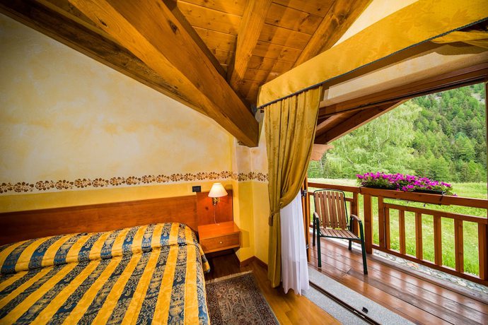 Imagen de la habitación del Hotel le Bouquet. Foto 15