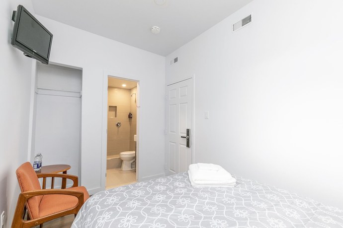 Imagen de la habitación del Hotel le Coach. Foto 9