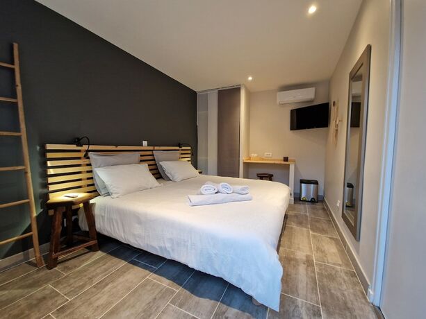 Imagen de la habitación del Hotel le Cosy. Foto 12