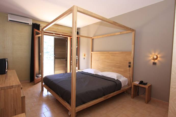 Imagen de la habitación del Hotel le Lonca. Foto 15