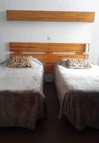 Imagen de la habitación del Hotel le YAKA. Foto 16