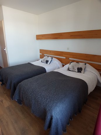 Imagen de la habitación del Hotel le YAKA. Foto 17
