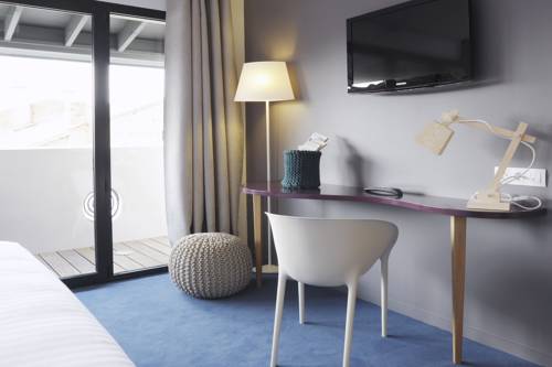 Imagen de la habitación del Hotel l'&eacute;chapp&eacute;e belle. Foto 4