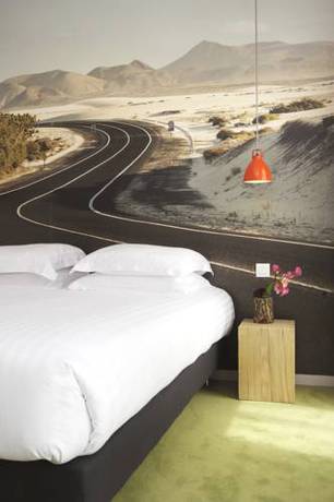 Imagen de la habitación del Hotel l'&eacute;chapp&eacute;e belle. Foto 5