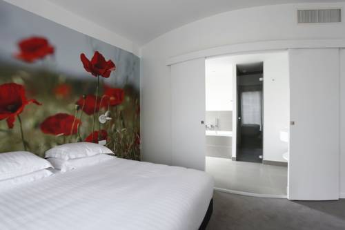 Imagen de la habitación del Hotel l'&eacute;chapp&eacute;e belle. Foto 10