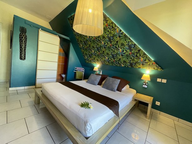 Imagen de la habitación del Hotel les Bougainvilliers, Saint-Paul. Foto 13