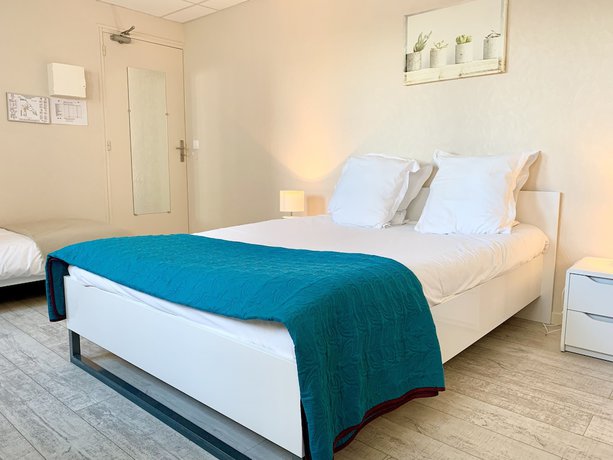 Imagen de la habitación del Hotel les Quatre Saisons. Foto 3
