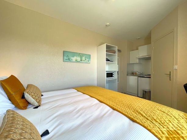 Imagen de la habitación del Hotel les Quatre Saisons. Foto 7