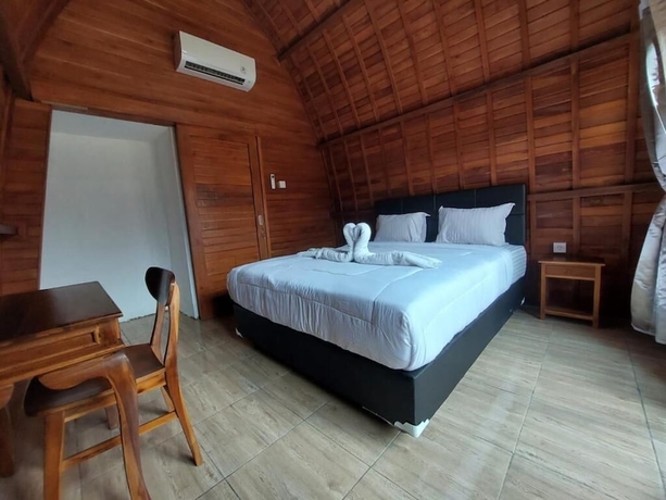 Imagen de la habitación del Hotel les chalets pecatu. Foto 5