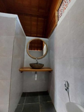 Imagen de la habitación del Hotel les chalets pecatu. Foto 11