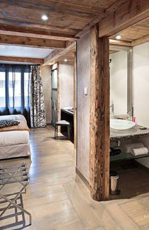 Imagen de la habitación del Hotel les suites - maison bouvier. Foto 5