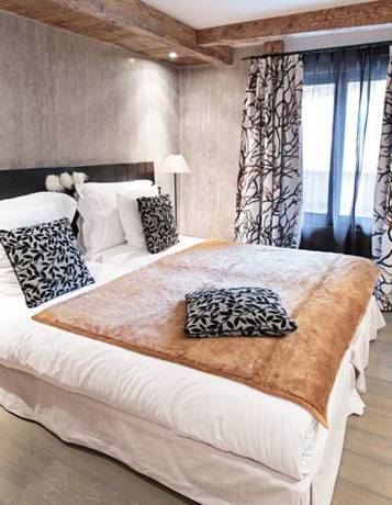 Imagen de la habitación del Hotel les suites - maison bouvier. Foto 7