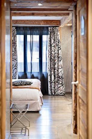 Imagen de la habitación del Hotel les suites - maison bouvier. Foto 8
