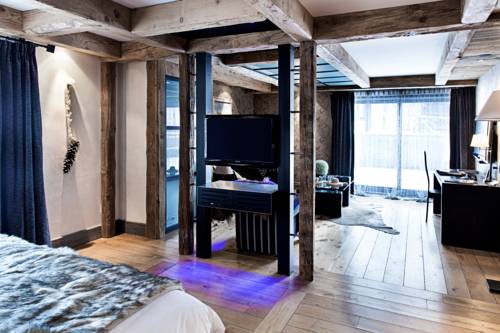 Imagen de la habitación del Hotel les suites - maison bouvier. Foto 12