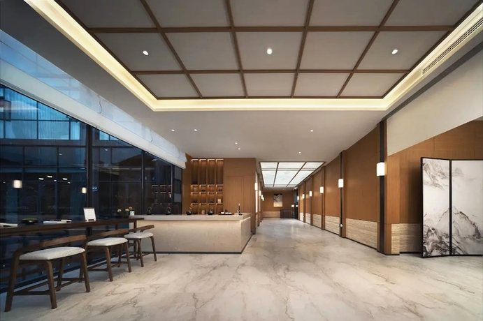Imagen de los interiores del Hotel leshanchanyiyilejiudian. Foto 11