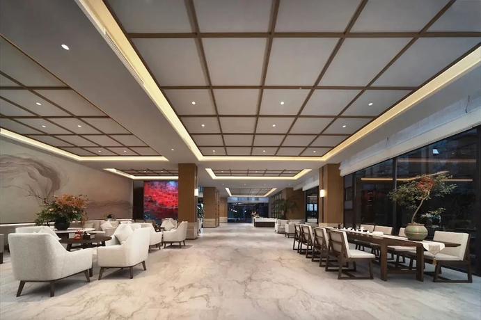 Imagen de los interiores del Hotel leshanchanyiyilejiudian. Foto 15
