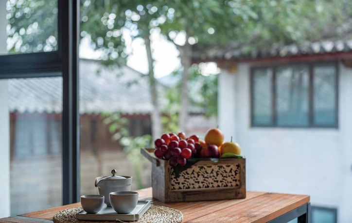 Imagen de la habitación del Hotel lijiangluxianbaomimihuayuankezhan. Foto 11