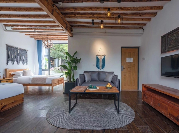 Imagen de la habitación del Hotel lijiangluxianbaomimihuayuankezhan. Foto 13