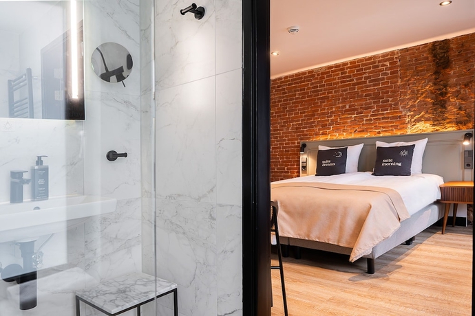 Imagen de la habitación del Hotel limehome Amsterdam Leidsekruisstraat. Foto 5